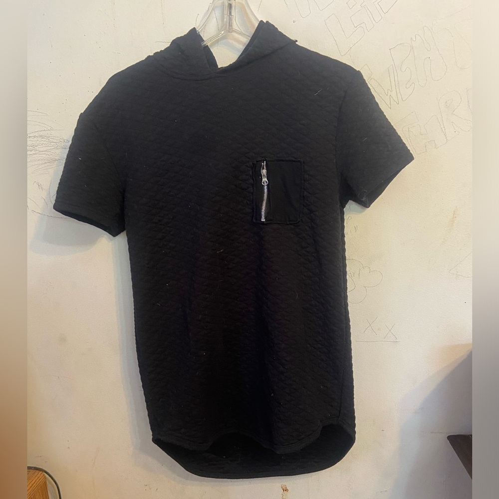 Fits like a medium. Black hooded t-shirt, with a silver zipper on the front